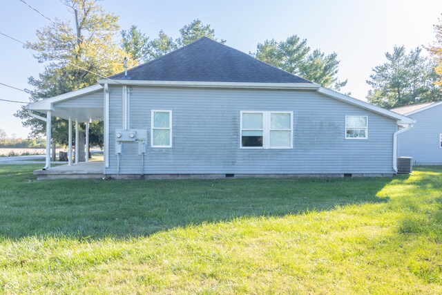 view of property exterior featuring cooling unit and a lawn