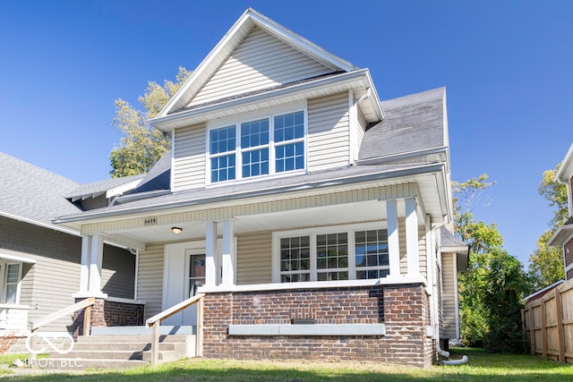 view of front of property featuring covered porch