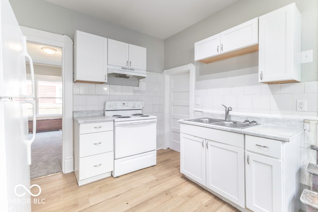 kitchen featuring sink, white cabinets, light wood-type flooring, and white appliances