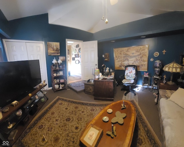 carpeted living room with lofted ceiling