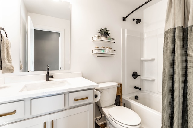 full bathroom featuring vanity, shower / tub combo with curtain, and toilet