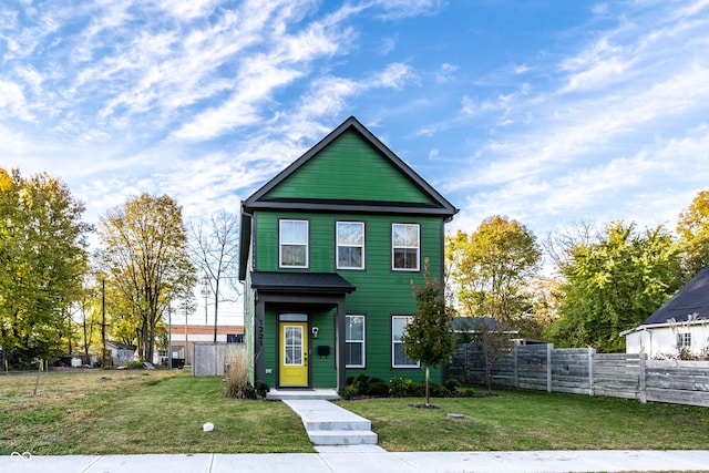 view of front property featuring a front lawn