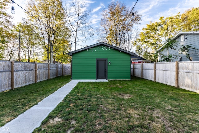 view of outdoor structure with a yard