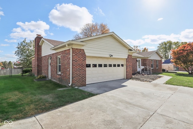 view of front facade featuring a front lawn and a garage