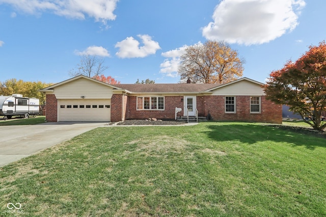 ranch-style house featuring a front yard and a garage