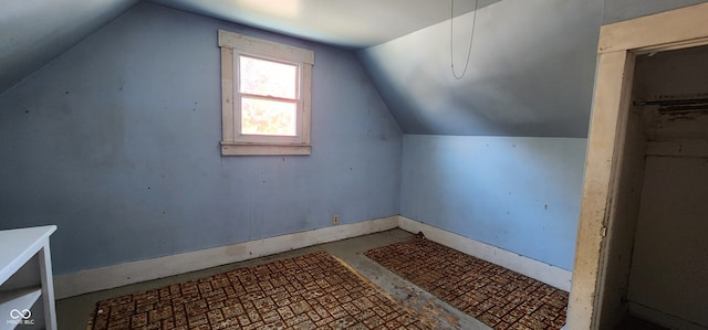 bonus room featuring lofted ceiling