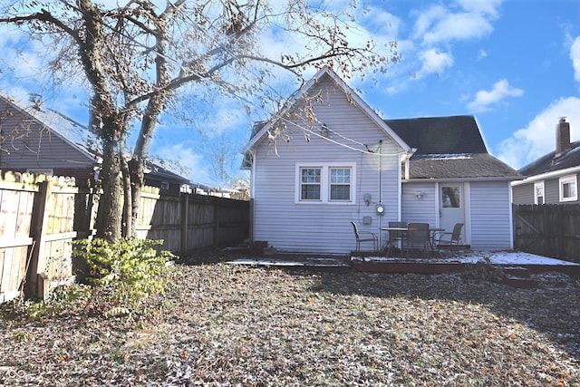 rear view of house with a deck