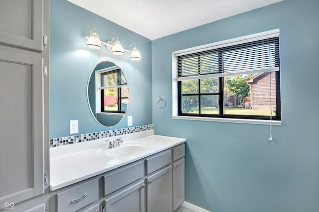 bathroom featuring vanity and a textured ceiling