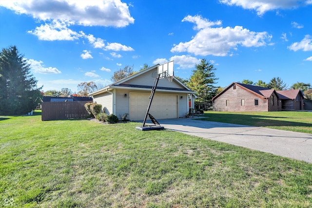 view of side of home featuring a garage and a lawn