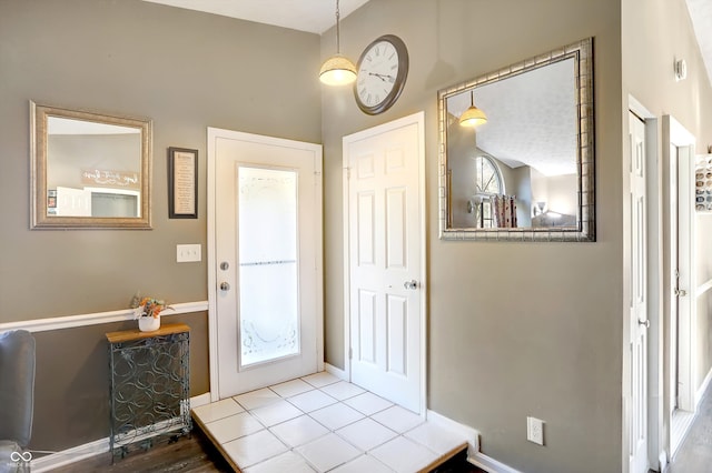 entryway with tile patterned flooring