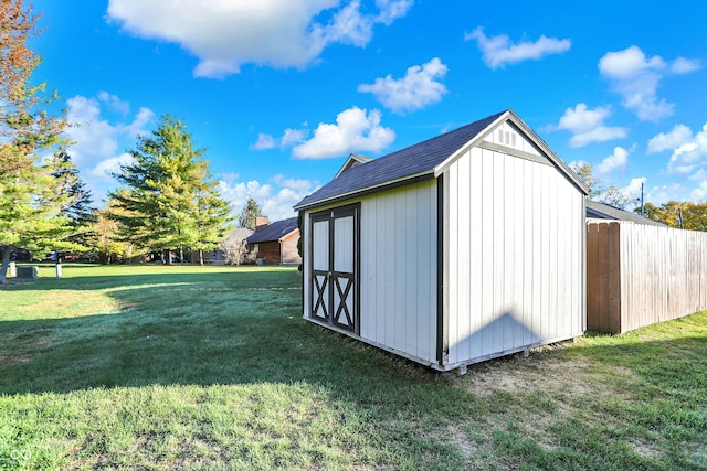 view of outdoor structure featuring a yard