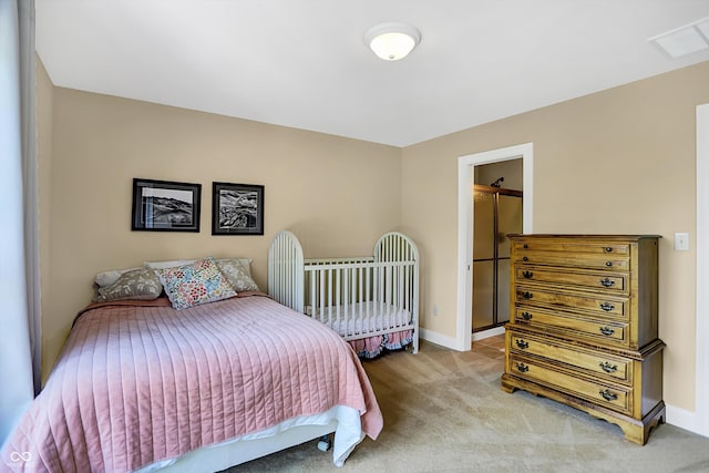 bedroom featuring refrigerator, light colored carpet, and baseboards