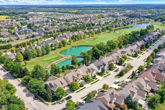 bird's eye view featuring a residential view, view of golf course, and a water view