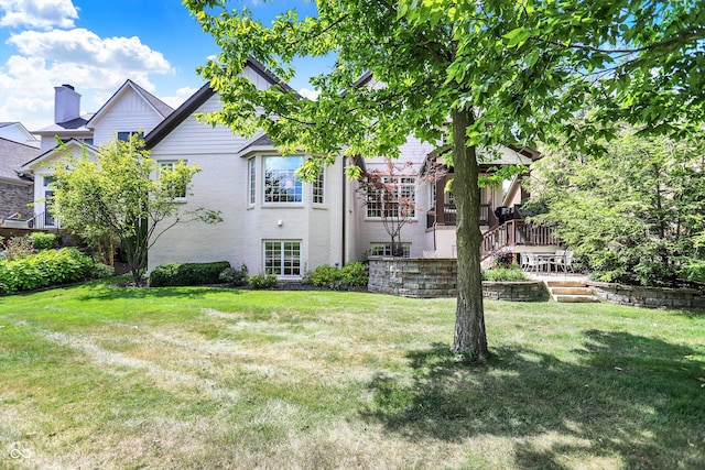 exterior space with a front lawn