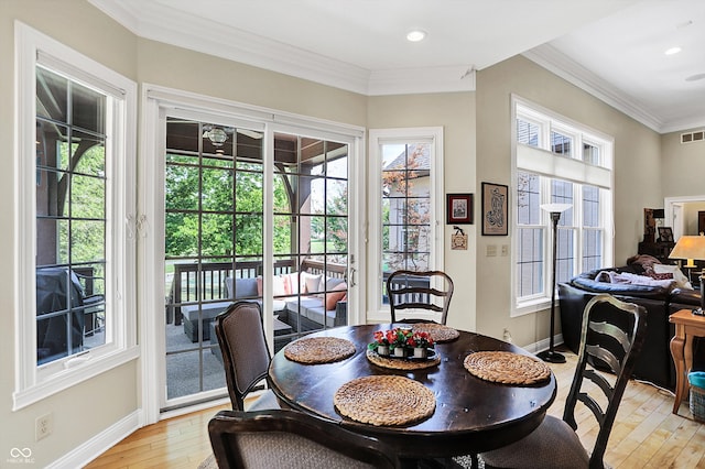 dining room with recessed lighting, visible vents, baseboards, light wood-style floors, and ornamental molding