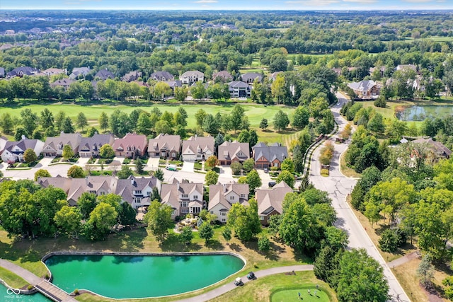 aerial view featuring a residential view and a water view