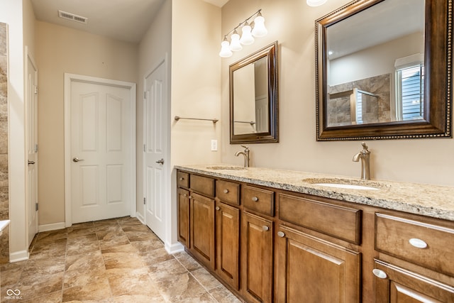 bathroom featuring vanity and walk in shower