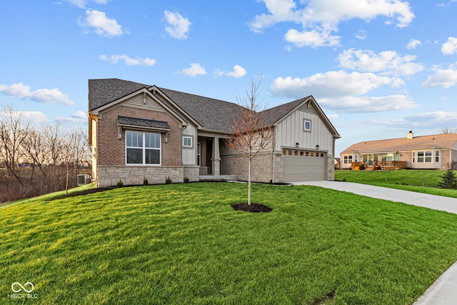 view of front of house with central AC unit, a garage, and a front lawn