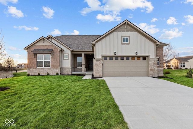 view of front of home with a front yard and a garage