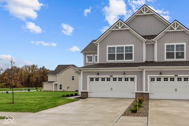 view of front facade featuring a garage and a front yard