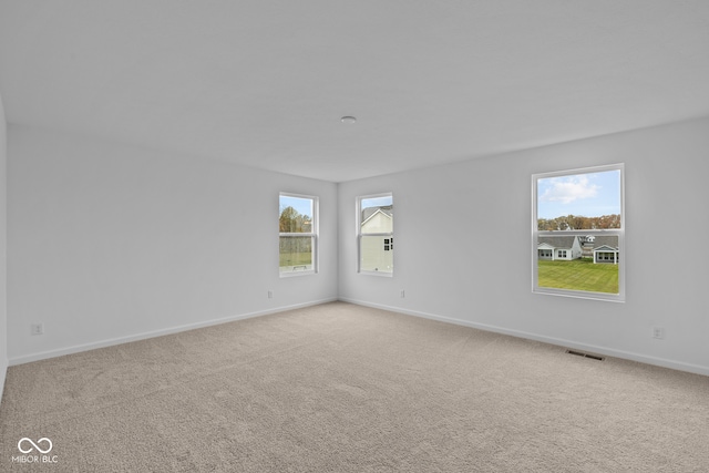 view of carpeted spare room