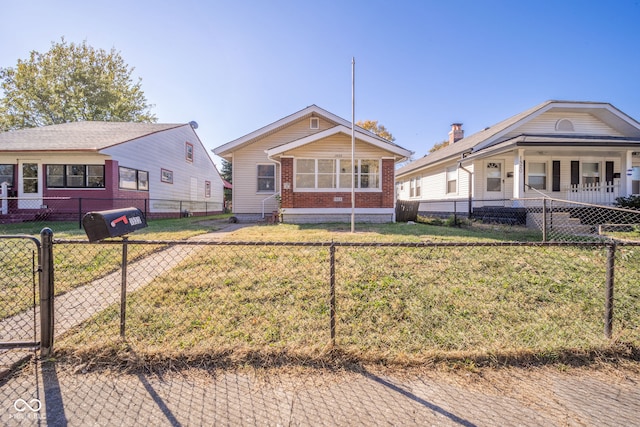 view of front of house with a front lawn and a porch