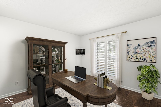 office area featuring dark wood-type flooring