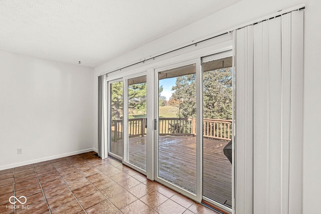 entryway with tile patterned floors