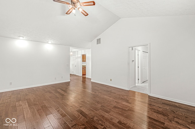 interior space featuring dark wood-type flooring, ceiling fan, high vaulted ceiling, and a textured ceiling