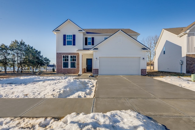 view of front of property with a garage