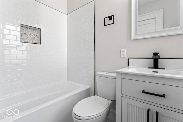 full bathroom featuring shower / bathtub combination, toilet, and vanity