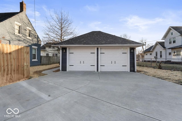 detached garage with fence