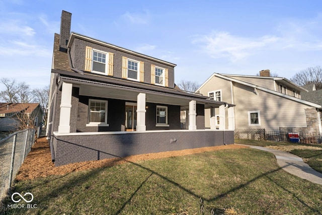 view of front of home featuring brick siding, a front lawn, fence, a porch, and a chimney