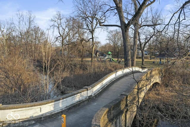 view of road featuring curbs