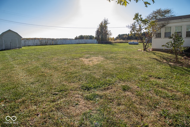 view of yard with a shed