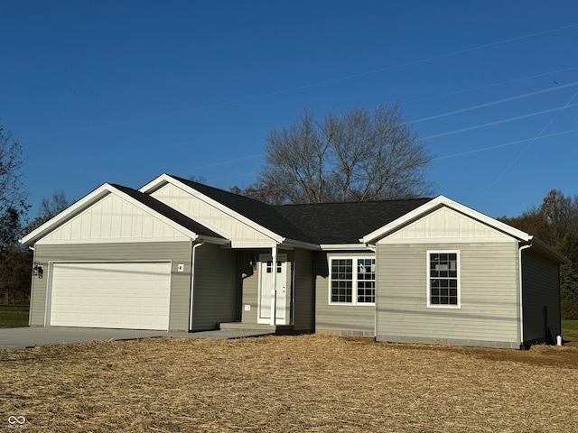 ranch-style home featuring a garage