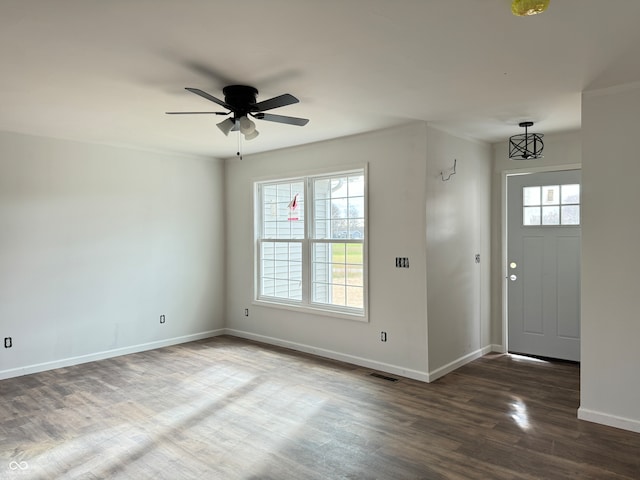 entrance foyer featuring dark wood-type flooring and ceiling fan