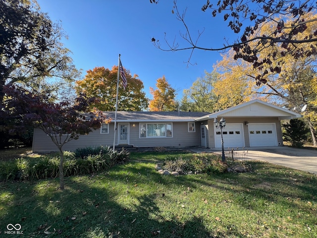 single story home featuring a front yard and a garage