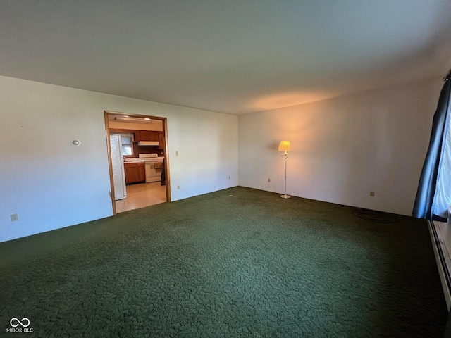 empty room with light colored carpet