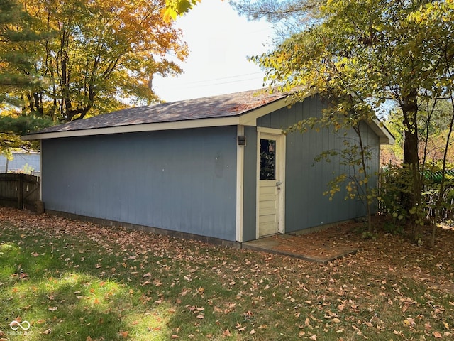 garage featuring fence