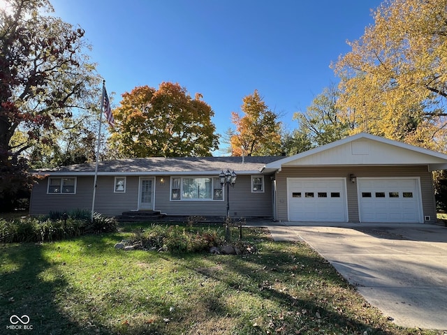 ranch-style house with concrete driveway, a front lawn, and a garage