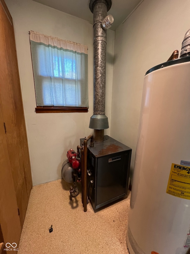 utility room with gas water heater