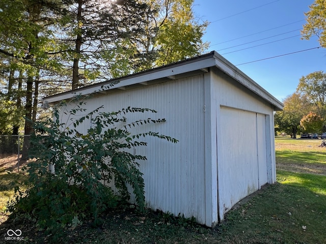 view of outdoor structure featuring a yard