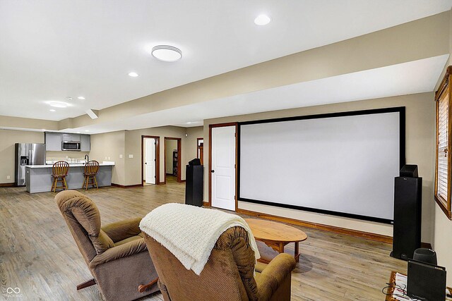 7178 Lockford N, Avon, IN 46123 - home theater room with recessed lighting, baseboards, and light wood-style flooring
