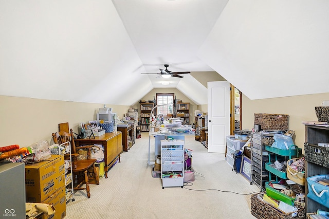 additional living space with vaulted ceiling, light carpet, and ceiling fan