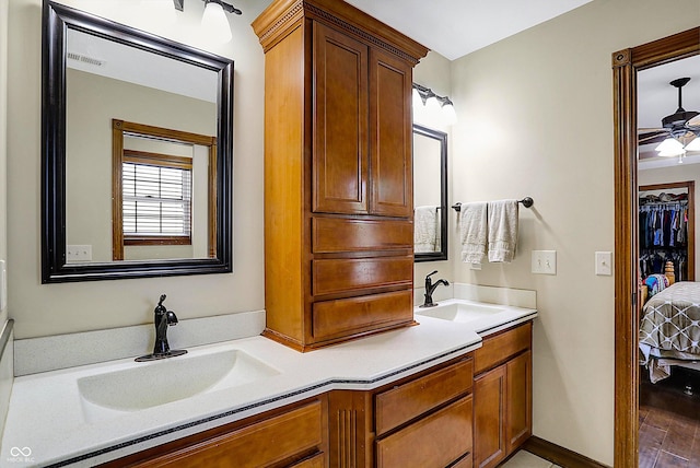 7178 Lockford N, Avon, IN 46123 - full bathroom with a sink, ceiling fan, double vanity, and visible vents
