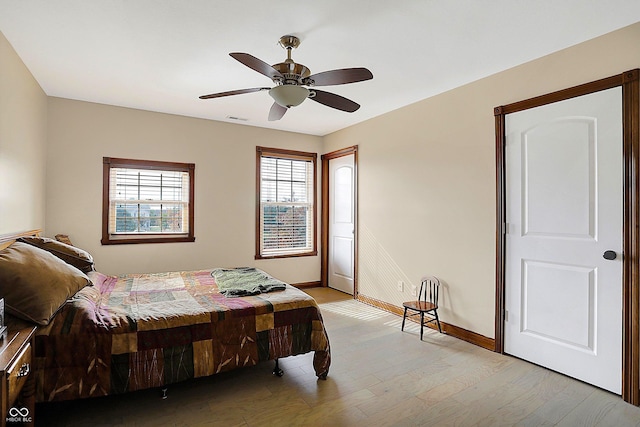 7178 Lockford N, Avon, IN 46123 - bedroom with ceiling fan, baseboards, visible vents, and light wood-style flooring