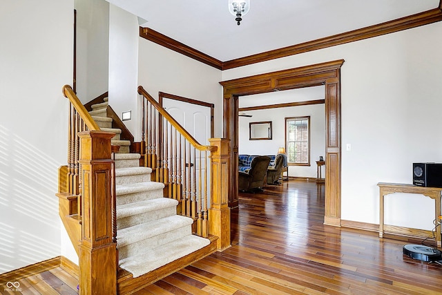 7178 Lockford N, Avon, IN 46123 - stairs featuring baseboards, ornamental molding, and hardwood / wood-style flooring