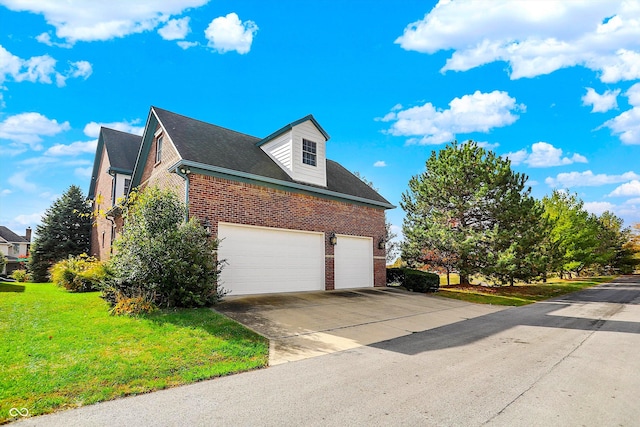 7178 Lockford N, Avon, IN 46123 - view of side of home with brick siding, an attached garage, a lawn, and driveway