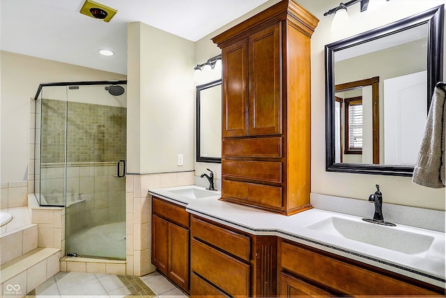 bathroom featuring vanity, shower with separate bathtub, and tile patterned floors